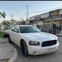 دودج تشارجر • ٢٠٠٩ • باب مصبوغ
