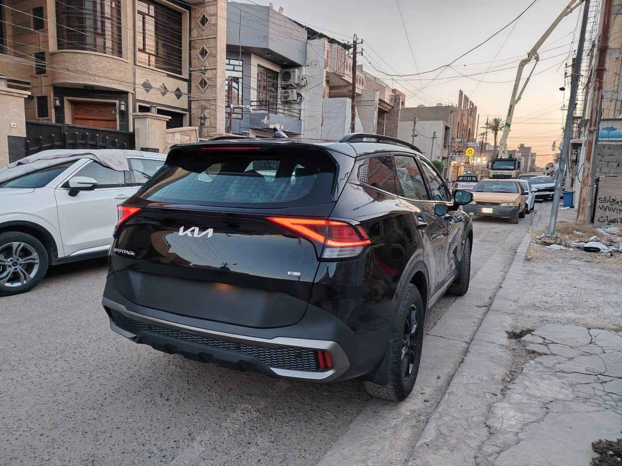 | كيا سبورتج X-Pro 2024 🚙
✨ فول مواصفات | دبل (4WD) | محرك 2500 سي سي

أبرز المواصفات:
✅ سقف بانوراما
✅ بصمة أبواب وتشغيل (Smart Key)
✅ كاميرا خلفية
✅ رادارات أمامية وخلفية
✅ حساسات أمامية وخلفية
✅ نظام النقطة العمياء (Blind Spot)
✅ بريك تلقائي للطوارئ (AEB)
✅ كروز كنترول تفاعلي (Smart Cruise Control)
✅ مثبت مسار (Lane Keep Assist)
✅ مقاعد جلد فاخرة
✅ كرسي السائق كهربائي مع خاصية الذاكرة (Memory)
✅ تدفئة المقاعد الأمامية
✅ تدفئة المقود (Steering Wheel Heating)
✅ Auto Hold + Auto Stop/Start
✅ شحن لاسلكي للهاتف
✅ منافذ USB شحن سريع
✅ جنطة كهربائية
✅ شاشة عدادات رقمية بثلاثة ثيمات مختلفة
✅ أوضاع قيادة متعددة (Drive Mode)
✅ إنارة LED أمامية وخلفية
✅ مكيف أوتوماتيك ثنائي التحكم
"سيارة مميزة جداً، استخدام نظيف، جاهزة للاستخدام ولا تحتاج أي مصروف."
📌 الوارد: أمريكي
📌 الحادث: موضح بالصور بكل شفافية.
📌 ملاحظة: الإيرباك المفتوح هو إيرباك الراكب الأيمن فقط.

💰 السعر المطلوب: 20,000 دولار (قابل للتفاوض بالمعقول بعد المعاينة).

📍 الموقع: بغداد

📞 للاستفسار: ***********
