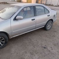 سياره نيسان سني ياباني موديل 1994 بغداد باسمي سنويه ل 30 كير ومحرك نيس...