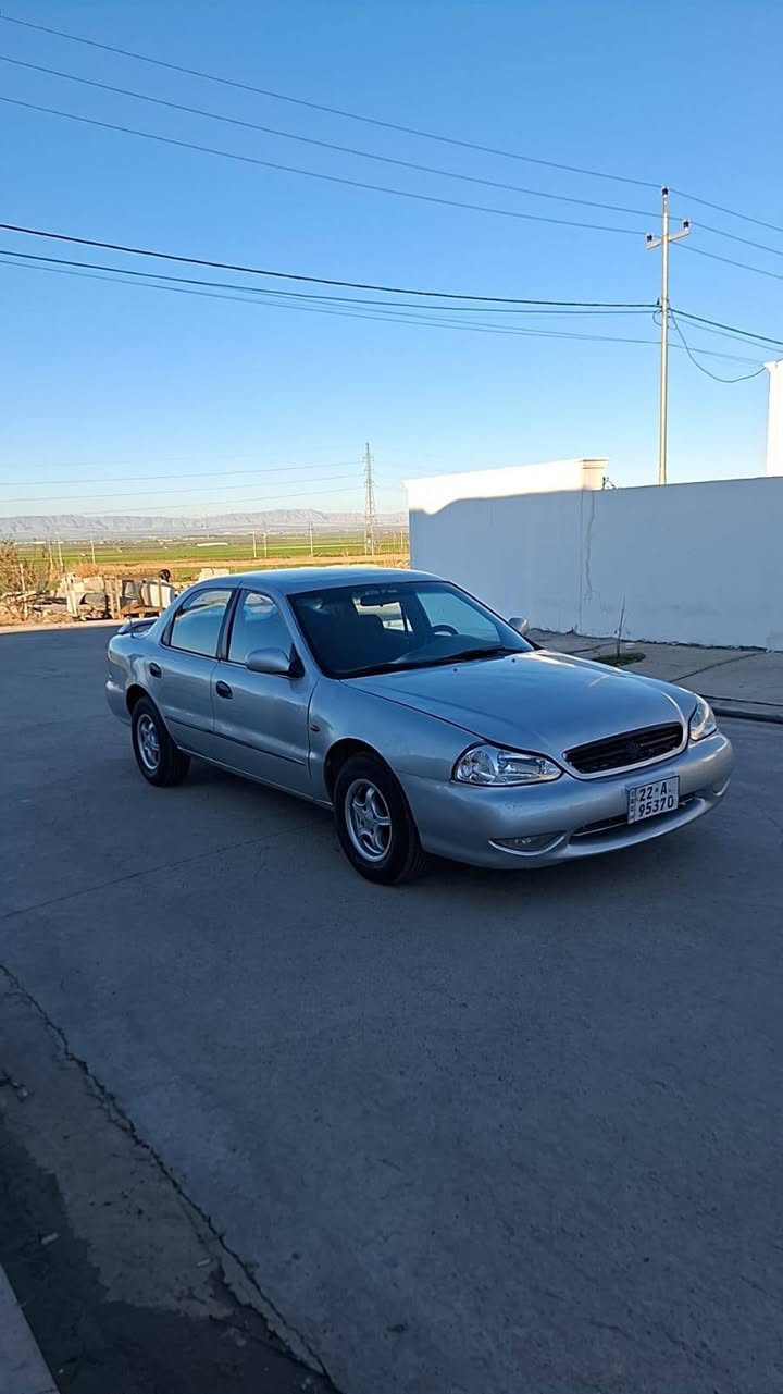 (***********) (***********) كيا كريدوس كير عادي موديل 2000  رقم اربيل رقم جديد هزة جديد سنوية جديد للغاية 2030 طخم اطارات جديدة لوك طخم حدادية جديد داخل غرفتها كلش نظيفة باقية عل وضع شركة صبغ عام جمالية سعرها( 42) و مجال مكانها قضاء بردرش بين اربيل و دهوك أربيل, العراق
