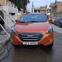 توسان 14 خليجي رقم بغداد باسمي  لون مميز مشمشي محرك 2000 دوش المرغوب ك...