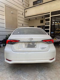 كورلا 2025  شكل الخليجي محرك 1800 هايبرد HEV  داخل جلد اسود رقم بغداد ...