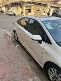 كورلا 24 هايبرد فول مواصفات حساس امامي خلفي ماشيه 15 الف كفاله من البا...