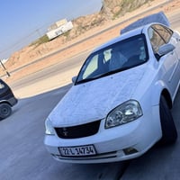 شۆفرلیت ئۆپترا مودیل 2011 گێڕ عادی یەک چاملغی پیشەوە سەکنی بۆیاخە چوار...