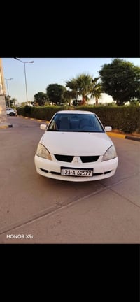 لانسر ٢٠٠٨ • محرك ١٥٠٠ • ضربة خفيفة