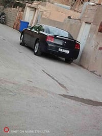 جارجر موديل 2009 سياره حلوه كير محرك كفاله سياره بدون حادث كنديه سياره...