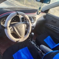 للبيع كيا ريو رقم بغداد 2009بسمي فول مواصفات ابرايد محرك وكير شرط تبري...