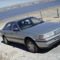 قطع مازدا اصلية • 626 323 • الموصل الجانب الايسر