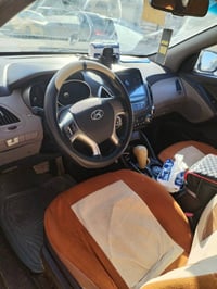 توسان،،2012 ،،مابيها صبغ ولا تبديل ،،محرك كير،،شرط،،السعر ،،147 /07708...