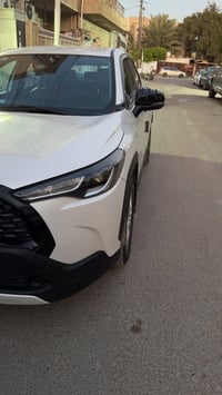 كورلا كروز وارد صيني مويل 2024 ماشيه 26 الف رقم بغداد ورقمها حلو بيه ج...