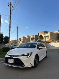 كورلا 2023 هايبرد  موصفاتها بصمه فتحة تبريد بيانو تبريد قطعتين لد نهار...