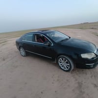 فولكسواكن باسات 2009 خليجيه بيها قطعه صبغ جاملغ خلفي اليسار  وبيها باب...