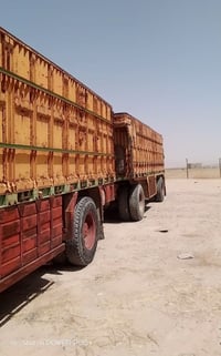 عندي قاطرا مقطوره تحمل 50 طن حصاد اذا احد محتاج بل شركاط  اتصل 0751145...