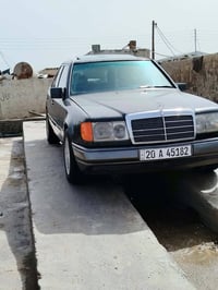 دبليو ١٢٤ • ١٩٩٠ • باسمي