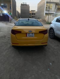 اوبتما موديل 2011  وارد امريكي رقم بغداد إنكليزي  مصفرة هيئة وغرامه مك...