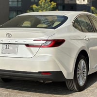 للبيع كامري 2025 خليجي ساز زيرو رقم بغداد باسمي مواصفات LE محرك بانزين...