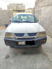 ميتسوبيشي • ٢٠٠٤ • رقم بغداد