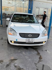 أوبتما موديل 2008 خليجي محرك 2000  رقم بغداد شرط التحويل تخم تاير جديد...