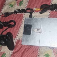 بلي 2 للبيع 'سعره 45 كامل ملحقات فلاش 32 GB توصيل موجود 07742964851