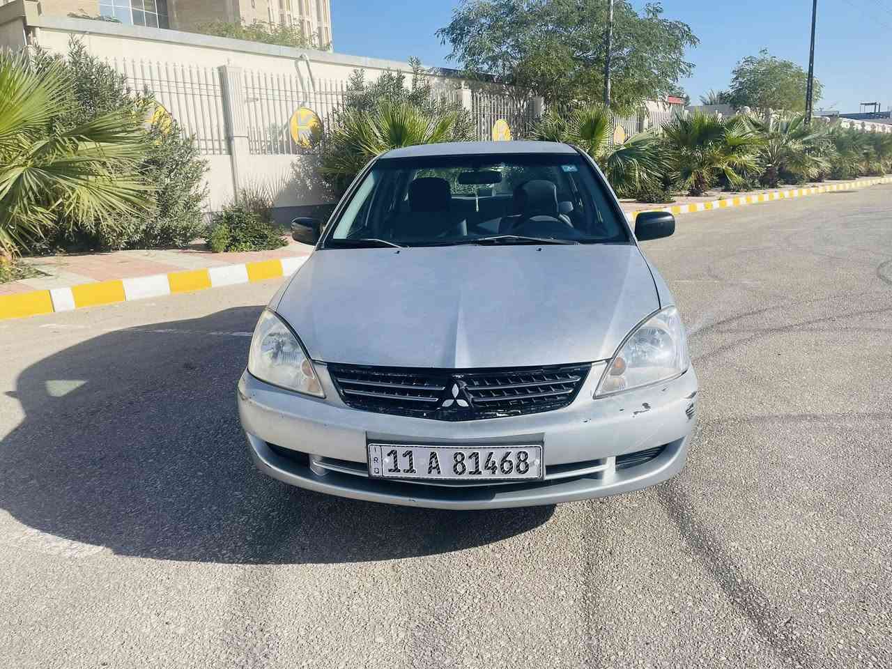 السلام عليكم لانسر 2010مكفوله بيها طخه بسيطه بلجاملغ الخلفي جوه قبق البانزين ومصبوغ فقط السياره ع وضع الشركه والسياره ممتعوبه ع ايد وحده ومالت. بيت السياره جاهزه من كلشي حداده امامي وخلفي كله جديد تخم تاير. باتري جديد تبريد ثلج كير  خير. من الله مكينه. بيه. خط بخار من 2010ممفتوح بيه شي 
سعرها 76وبيه مجال 
*********** مكاني. نجف السياره بسمي
