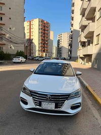 ‏ام جي 5  موديل 2023 ‏السيارة comfort رقم بغداد  ‏السارة ماشيه 66000 ا...