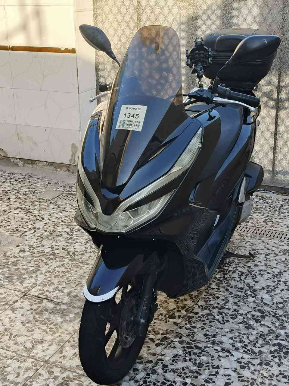 سلام عليكم بي سي إكس جيل الثالث
وارد كوري مكفولة كفاله عامه
ماشيه 21 ألف حقيقي جامه طويلة
حاملة مبايل جنطه اصليه لون أسود ملكي 
تاير الشركه نفس نقشه دراجه خير من الله 
سكن بغداد حي النصر  ***********
