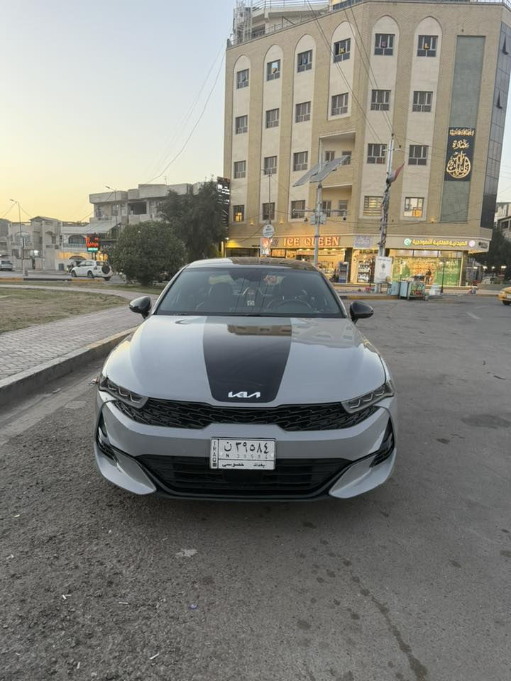 سلام عليكم كي فايف k5
موصفات جتي لاين 
فول على الاخير  موصفات بنوراما 
موديل 2022
1_الون  سمنتي 
2بصمه 
3 ماشيه50mi
4 داخل احمر 
5 كشنات هيترات
6 بصمه
5مثبت سرعه
6نضام ABS
7مانع انزلاق
8حساس  اطارات 
9بك لايت لد
10شاشه كبيره لمس
11كامره دواره
12كشافات اماميه 
13شاشه عطال 
14ويا كروم 
15ردار جانبيه 
16مراقبه نقطه العمياء 
17ردار الخطوط البيضاء  ردار امامي وخلفي وجوانب السياره 
18شاير  با المري 
19كشنات جلد احمر
20مقعد ساق كهرباء 
21الايت ثلاث عدسات +ليد 
22نضام قياده خمس وضعيات 
23 توقف ذاتي
24بلوتوث +usb+auX
25 تحكم ستيرن مع تدفئه بالستيرن 
26كير اوتو +عادي 
27الخريطه 📍
28صندوق كهربائي
 29 زنود + ليد 
30نوتو هولد
31التشغيل عن بعد 
‏AUTOHOLD   32
33تصميم خارجي رياضي 
34نضام المحلاحه
35مصابيح الخلفيه LED
36مصابيح ضباب LED
37محرك تيربو 1600

تشغيل عن بعد قيادة ذاتيه اربع قيادات بيها 
صور الحادث مرفقه مع الصور
رقمي ***********
مكاني بغداد لاعضميه168
 وبيها مجال لشراي 
رقم معوقين بغداد /وكاله عامه بأسم المشتري
