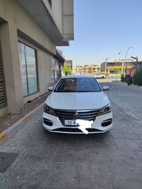 ام جي 5 • MG 5 • موديل 2025 • سيارة اوتوماتيك • كريمي • اربيل • ويل كب...