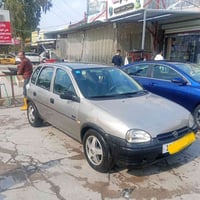 سيارة اوبل فيتا بلادي موديل 1996 كير ومحرك بلادي  تخم تايرات جديد  كهر...