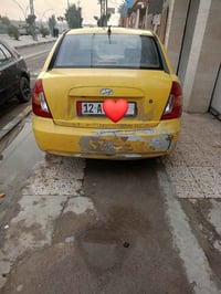 اكسنت دبدوب  موديل 2009 محرك وكير شرط مال كصه  هيئه وغرامات صفر واني ا...