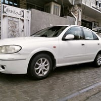 نيسان سني 2008 محرك اسود تخم تاير جام كهرباء  بغداد السعر 90$ 07713240...