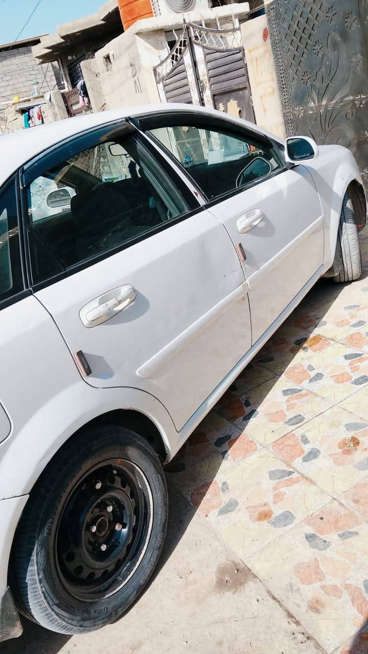 سلام عليكم اوبتراء موديل 2011 خليجي رقم بغداد دولي  كفاله صبغ وتبديل فقط صبغ دوسات وشويه من حافه جملغ محرك قبل شهر شديته كير تبريد كفاله داخل نضيف تخم تاير جديد مبيه نقص سعر 77 وبيه مجال مكان بغداد المحموديه رقم الهاتف ***********
