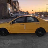 كيا سبكترا، 2009  رقم بغداد نكليزي سنوية وهزه جديده مصفره هيئة وغرامات...