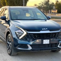 Kia Sportage Hybrid 2023 مواصفات السيارة  1.حساسات أمامية خلفية جانبية...