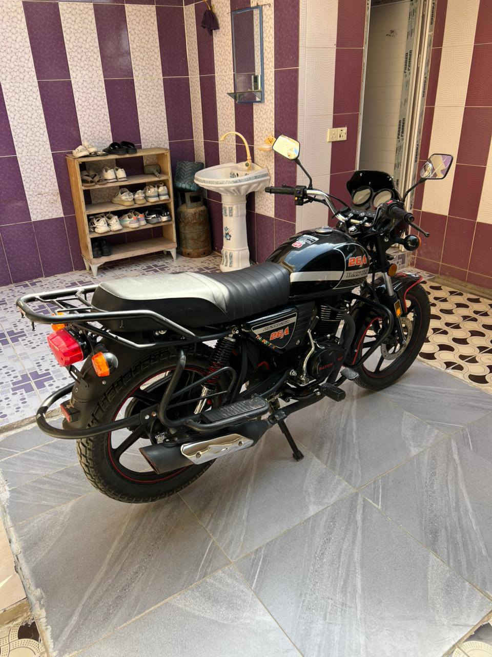 سلام عليكم دراجه مديل 25 اوراق سحب محرك 200 نضيفه وكاعده سعر 1300 وبي مجال مكان ديالى دلي عباس رقم ***********
