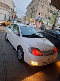 كورلا بيكاجو موديل 2001ياباني اصلي للبيع السياره مرشوشه حزام جماليه سع...