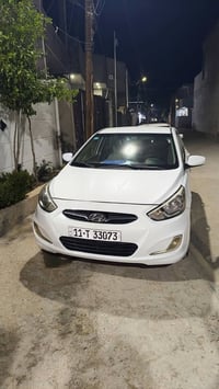 اكسنت موديل ٢٠١٥ صبغ بنيد وربع باب بيه بارد جاملغ ومكانات قليله نظيفه ...