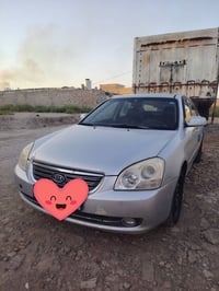كيا اوبتما لوتز للبيع رقم انكليزي السياره بأسمي السياره مكفوله من كلشي...