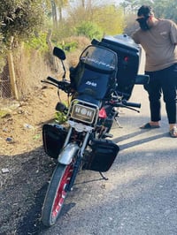 ايراني ضاغطه وسنجيل دراجه خير من الله مزوده صندوك كبير +وسستم سماعات +...