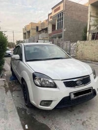 كيا ريو ٢٠١١ خليجي بدون ضرر رقم شمالي  السعر ٩٥ للتواصل ٠٧٧١١٩٥٦٥٨٥
