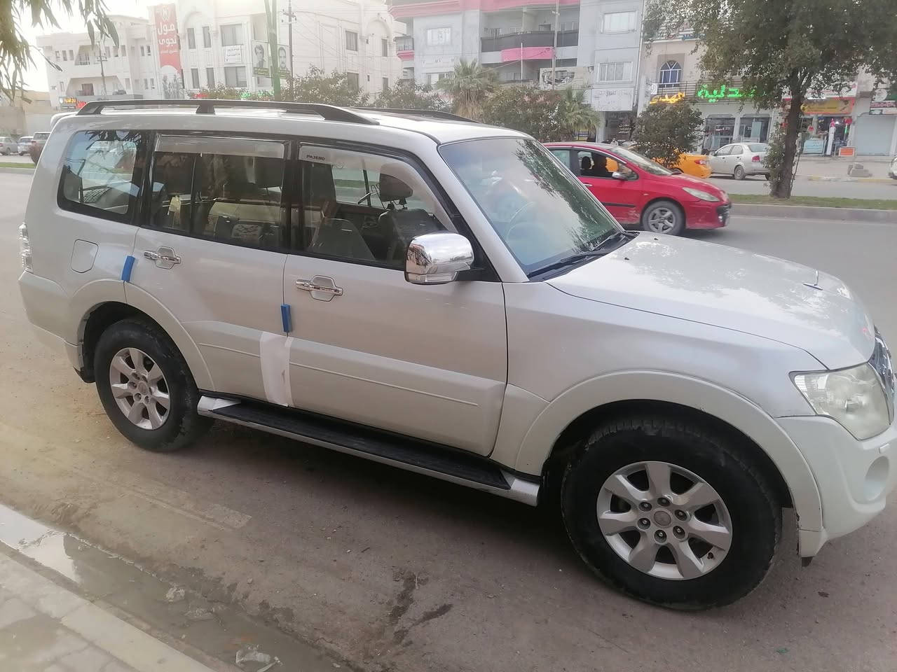 باجيرو ٢٠١٤ مكفول من صبغ وبارد رقم سليمانيه سعر ١٦٠ $    رقم موبايل ***********
