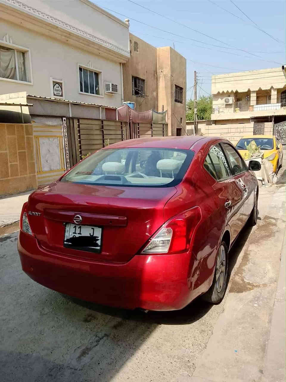 السلام عليكم ورحمة الله 
نيسان  صني  موديل 2012 شكل ال14
رقم بغداد سنوية بإسمي
مواصفات خاصة 
4جام كهرباء 
يدات داخل وخارج نيكل
بطاين بلاستك وقماش  
شاشة بلادية
مساند اماميه  وخلفية
تچاوي  بلاد 
ويل كب بلاد 
تحكم استيرن لون تيتانيوم 
گير مكينة صدر تبريد گشر كله ممتاز
مكان قرب العاب السيديّة  
ابو علي////‭0773 268 9251‬
