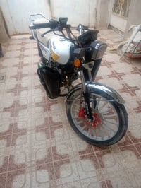 دراجة ايراني موديل 25البيع السعر 900وببه مجال دراجة مكفوله الرقم 07777...