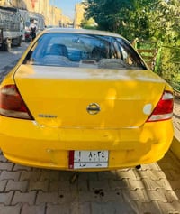 سيارةللبيع نيسان سني بدي كوري موديل 2012 بابل  موجودة بغداد الشعلة  07...