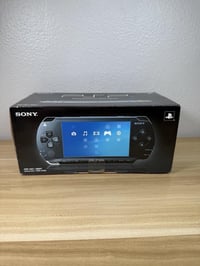 PSP 1000 • مهكر ٦.٦١ • ١٠٠ لعبة
