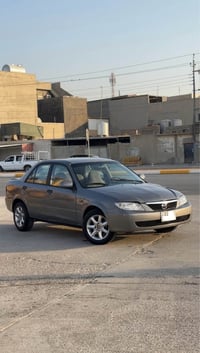 مازدا 323 • ٢٠٠٤ • رقم أربيل