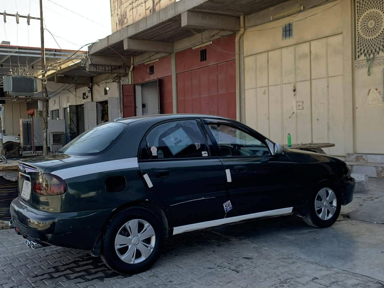 سياره دايو لانوس للبيع سعر٣٨ورقه بي مجال رقم م *********** سنويه لحد ٢٠٢٧
