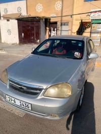 اوبترا 2005 رقم كربلاء بيه تبخير تبريد شغال سياره حلوه بس ريدله اشويه ...