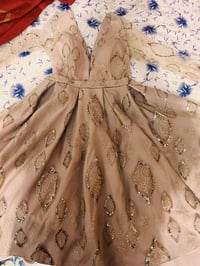 بدله ملبوسه ساعتين راقيه بلبس وجديده قصيره ومن وره تسحل ذيل قياس 42 ما...