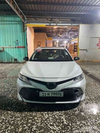 كاميري 2019 ساس بانزين اللون صدفي رقم بغداد الجديد فول موصفات GLE بصمه...